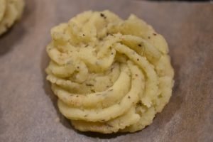 Bagt kartoffelmos i ovn - små kartoffelrosetter