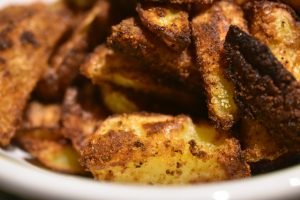 Pommes frites med rasp og krydderi - opskrift
